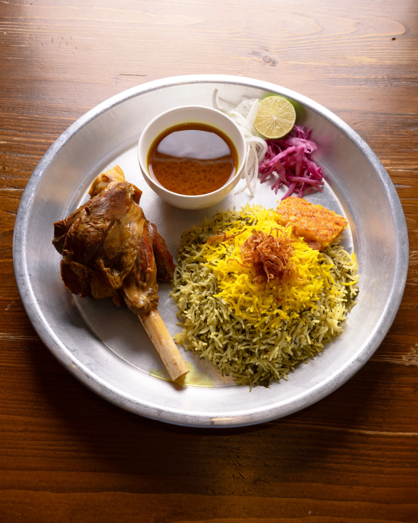 Mahicheh, braised lamb shank